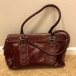 Rafe dark red patent leather handbag.